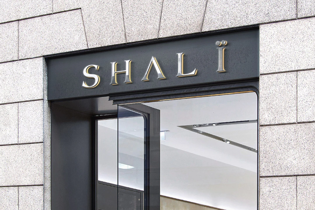 Shali metallic storefront signage